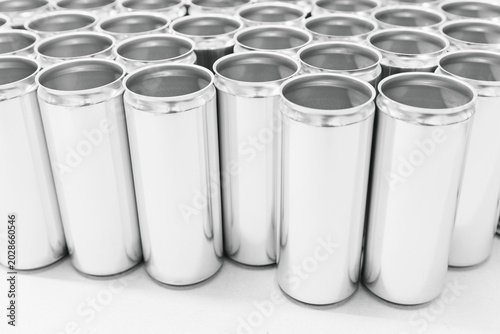Rows of empty cans in beer factory production line