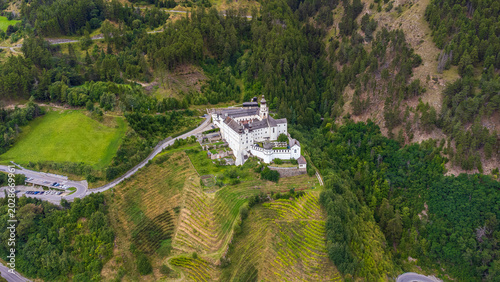 Valokuva 4K aerial view of Marienberg Abbey, Europe's highest Benedictine monastery in South Tyrol, Italy