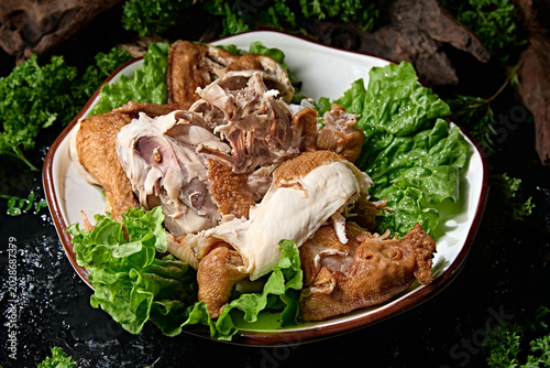 Photos Delicious smoked whole free-range chicken, torn apart by hand