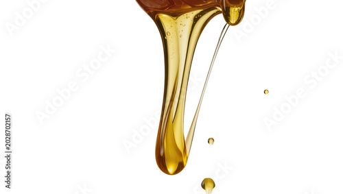 Tableau sur toile Thick golden honey dripping in viscous strands, isolated on transparent backgrou