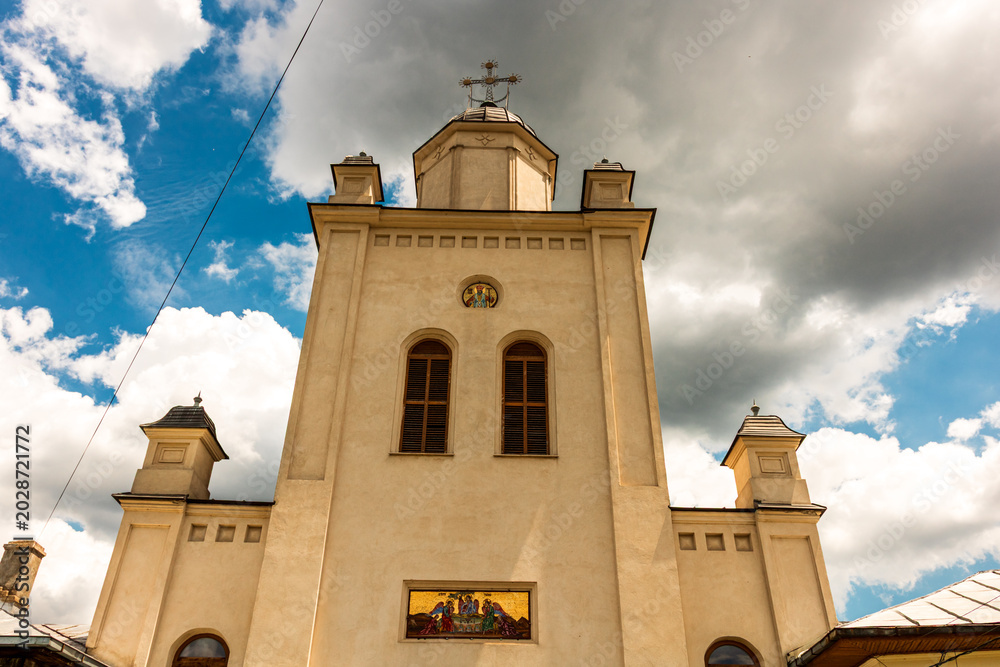Fototapeta premium Beautiful view of Pasarea Monastery (Pustnicu Monastery) historical church architecture in the forest near Bucharest