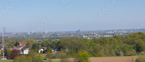 The skyline of Dortmund, Germany, featuring the Floriansturm and the football stadium.