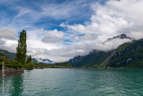 Scenic View of Brienz Lake with Mountains and Clouds