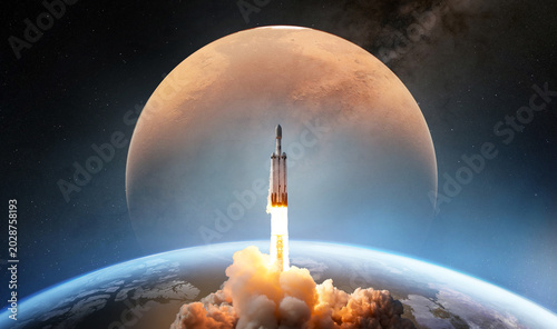 Cuadro en lienzo Powerful space rocket launch above planet Earth with Mars in the background