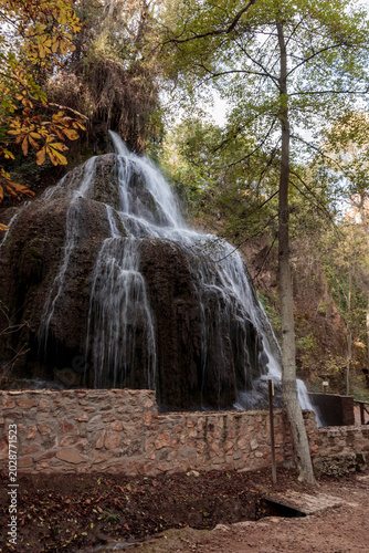 Slika na platnu Monasterio de piedra waterfall flowing over rock formations