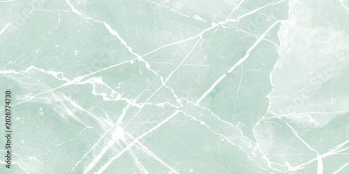 Photos Linear green marble texture with diagonal and taupe veins, polished stone surface, architectural backdrop