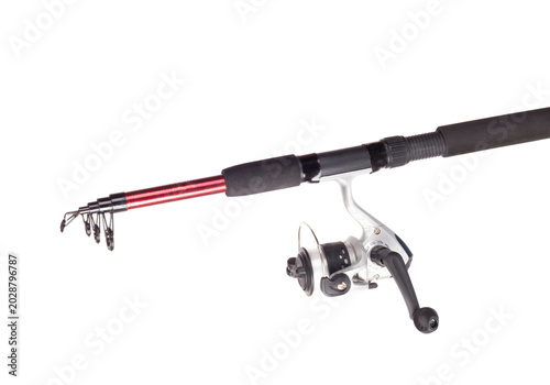 Fotografija Telescopic fishing rod with spinning reel, collapsible fishing pole isolated on