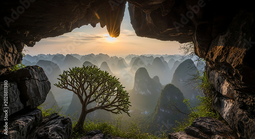 Tree in Cave with Mountain View at Sunset