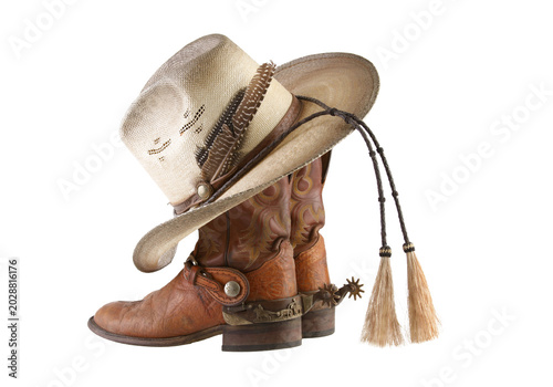 Brown western cowboy boots with beige hat, rodeo footwear isolated on transparent background PNG