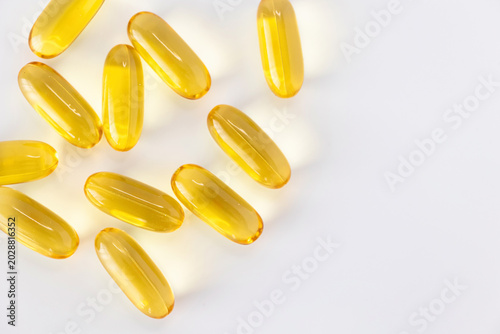 Canvastavla Yellow omega 3 fish oil capsules isolated on white background with copy space