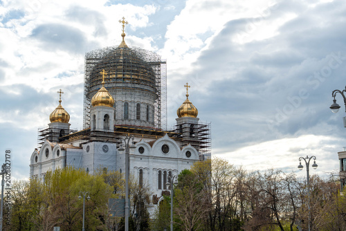 Photos White Cathedral Domes Framed By Trees, Soft Spring Foliage Surrounding Ornate Sp
