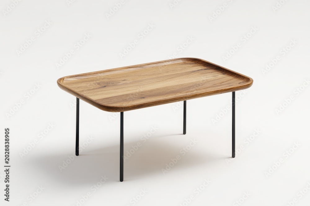 Fototapeta premium Modern rectangular side table with rounded corners against a clean white background