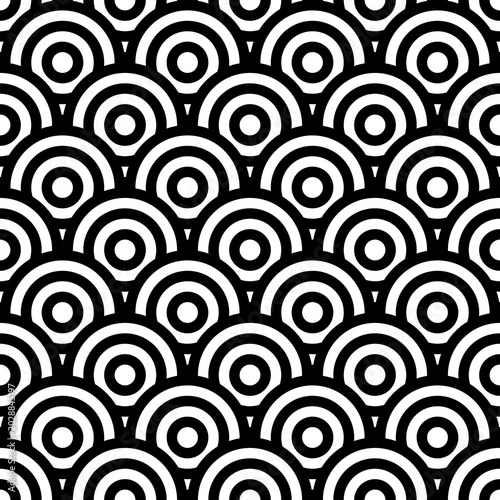 Fish scale wallpaper. Asian traditional ornament with repeated scallops. Repeated white circles and semicircles on black background. Seamless surface pattern design with rings. Vinyl motif. Vector.