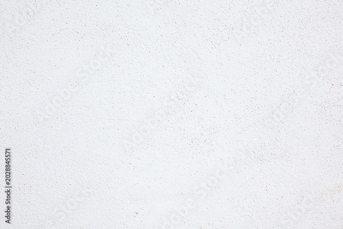 Fondo de pared de yeso blanco liso y limpio con textura de grano sutil, superficie de diseño minimalista. Fondo de textura de pared blanca para diseños gráficos, fondos de sitios web,recursos digital