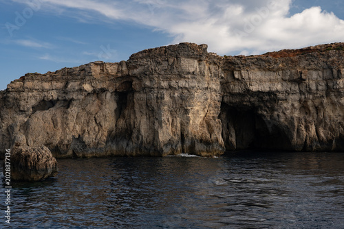 Epic tropical resort island rocky coastline horizontal panorama turquoise sea water view.
