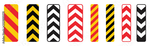 Fotografie Directional Warning Sign Collection: A vibrant array of chevron signs, indicating direction and caution