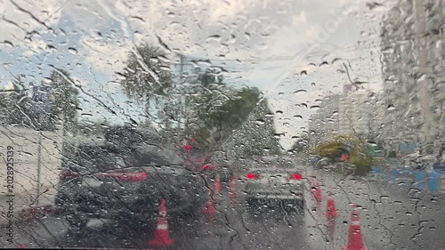 raining, droplet of water on Car mirror at Evening