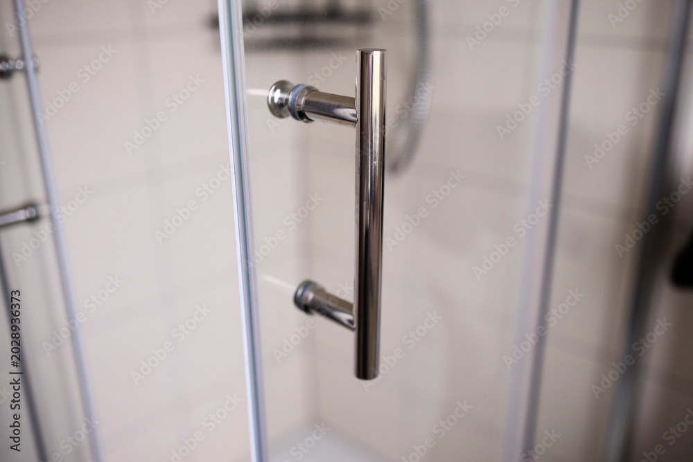 Fototapeta premium Simple Door Handle on Cheap Glass Door