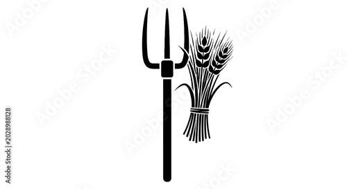 Obraz na płótnie Wheat Bundle with Farm Tool Pitchfork.