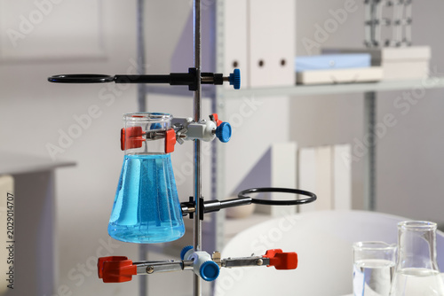 Stand with flask of water sample in research laboratory