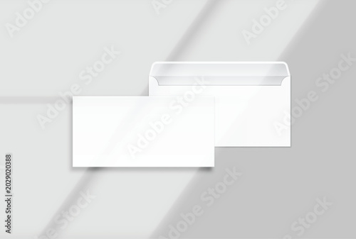 Blank white DL envelope mockup set with elegant organic shadow overlay isolated on background. Open and closed view of realistic paper mailer for business letters, corporate branding, and stationery