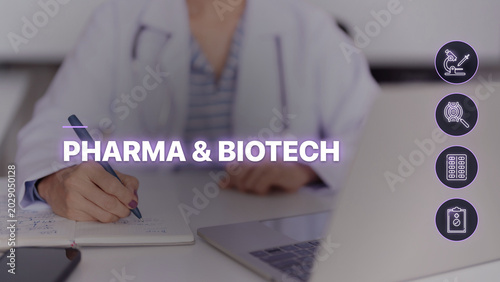 Asian scientist writing pharmaceutical research data notebook laptop computer desk biotech laboratory medical professional working drug development project