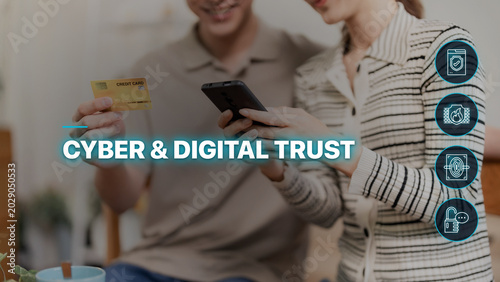 young Asian couple using smartphone with credit card for online shopping payment secure digital transaction cyber security trust authentication technology home