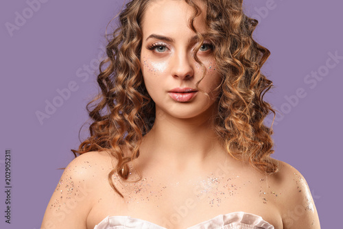 Beautiful young woman with ...