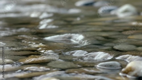 Water Droplets on Smooth Surface Closeup.