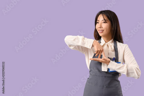 Young happy Asian woman in ...