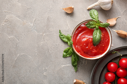 Bowl of tasty tomato sauce ...