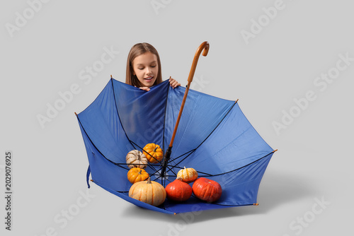 Cute teenage girl with blue...