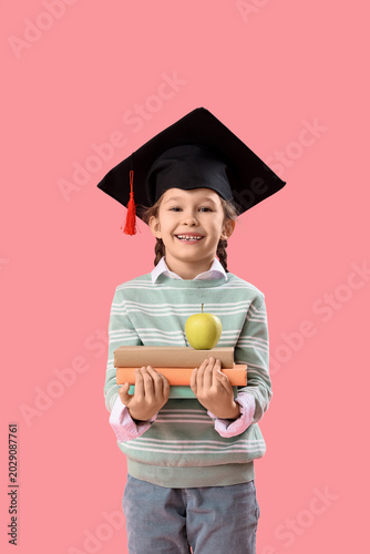 Little girl in graduation h...