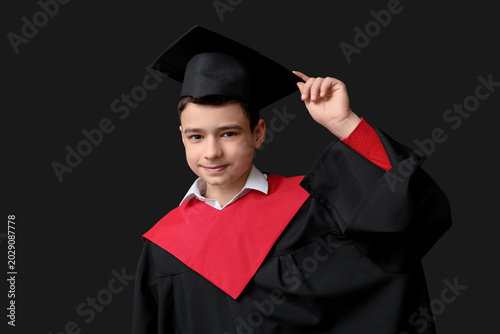 Cute schoolboy in bachelor ...