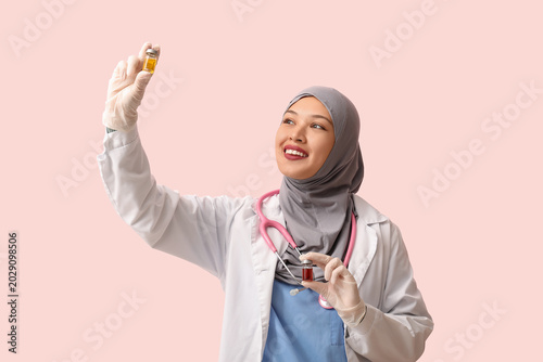 Female Muslim doctor in hij...