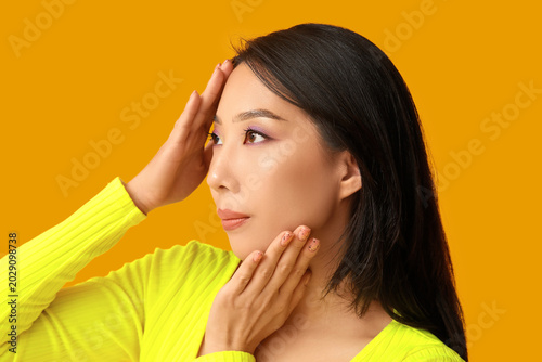 Young Asian woman with beau...