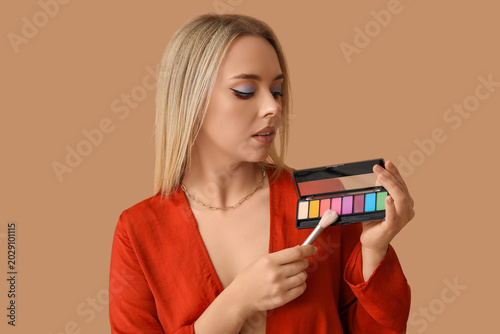 Beautiful young woman with ...