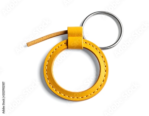 A yellow leather keychain with metal ring and stitching (1)