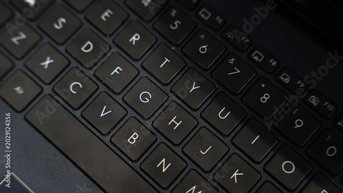 Photos Close Up of Black Laptop Keyboard Keys with Selective Focus