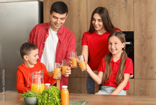 Happy parents with their li...
