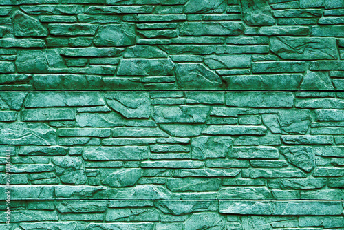 Turquoise stone brick wall detailed contrast texture background