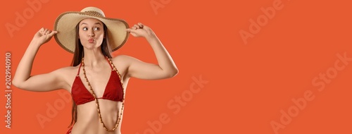 Cute young woman in stylish...