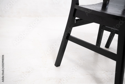 Warm wooden chairs with woven cane backs. Curved seats and slender legs create elegant design. Simple, minimalist style suits modern interiors. Ideal for cafes, homes, or cozy dining spaces.