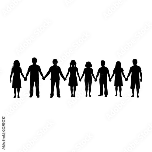 Silhouette of diverse children holding hands in a line representing unity and friendship.