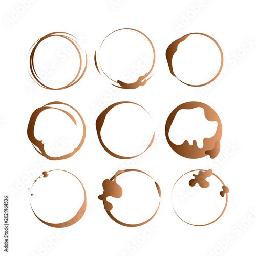 Collection of brown coffee cup ring stains and liquid splatters, perfect for grunge backgrounds, beveragethemed designs, or abstract textures on white.