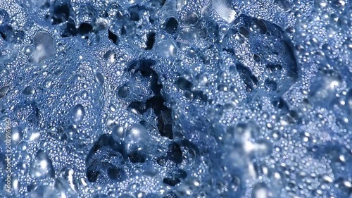 Texture and bubbles of indigo blue background.