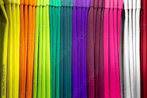 Valokuva Multicolored fabric hangs in a fabric store for display to a customer