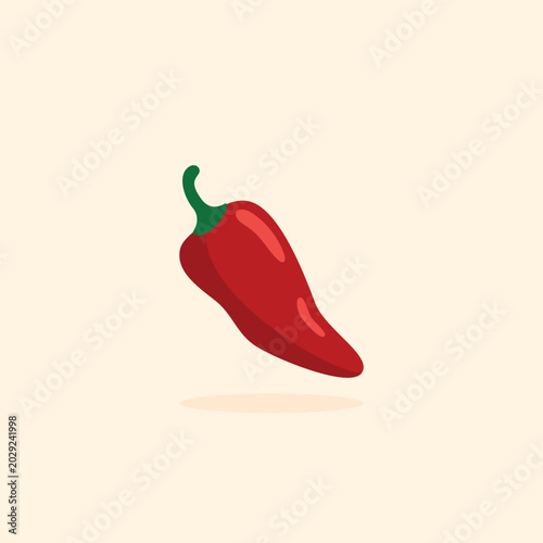 Foto Red chili pepper floats gently against soft beige background
