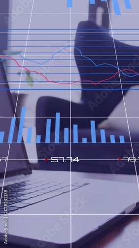 Vertical video: Laptop projecting overlay, bars rising and donut rings updating to display metrics