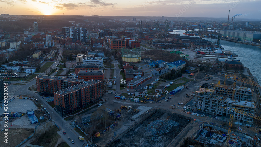Fototapeta premium Gdansk Waterfront Aerial View at Sunset - Industrial Port City Landscape